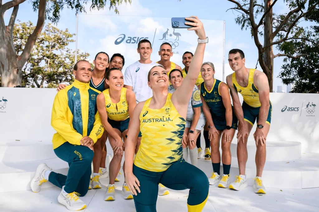 Athletes unveil the Australian team uniform for the 2024 Paris Olympic Games during a launch | The Guardian