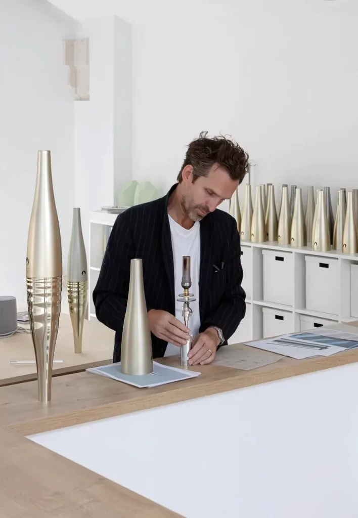 Mathieu Lehanneur working on the Paris 2024 Olympics torch in his studio | Forbes