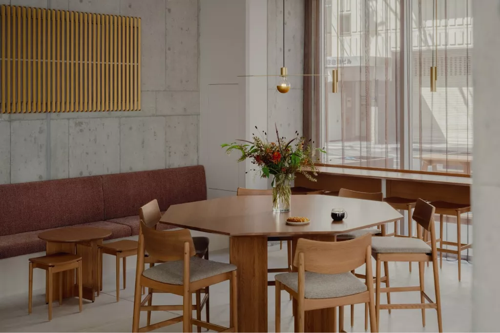 Exposed concrete walls with yellow tone metal | LR