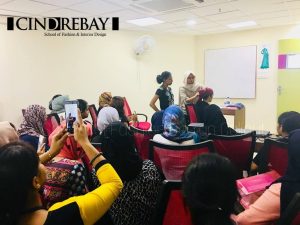 Students listening with rapt attention to the lecture.