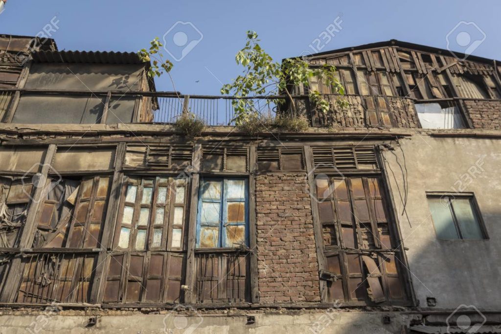 old abandoned wood building in main bazar street at Paharganj, New delhi, India.